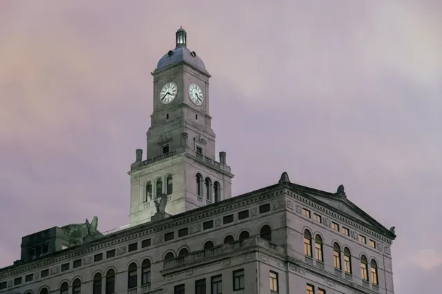 Davenport Bank building clock tower at dusk